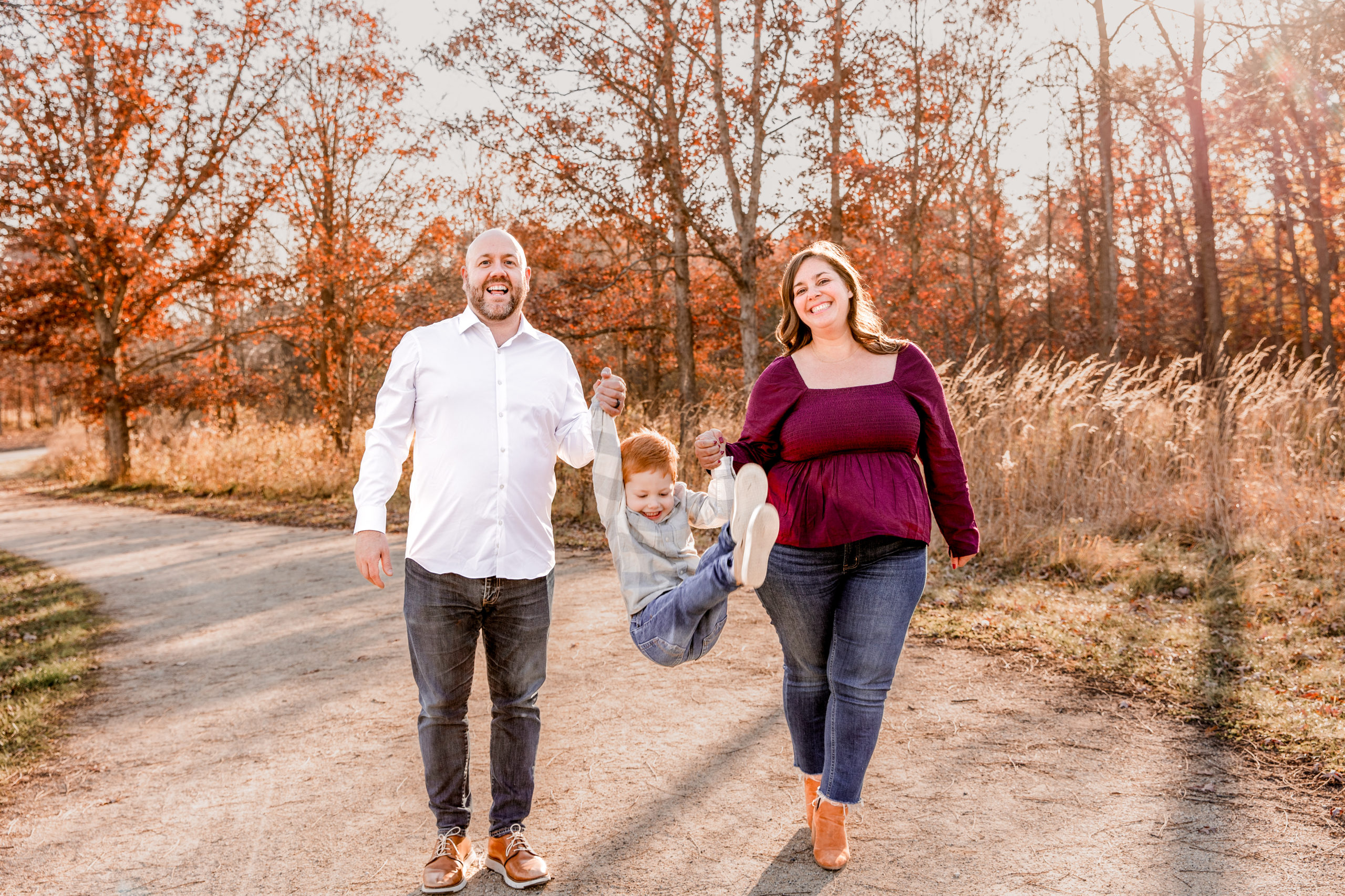 family walking pose during fall portrait session