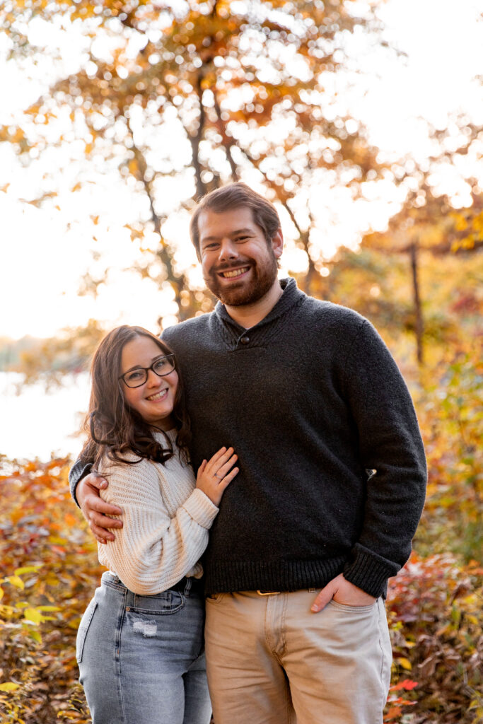 portrait of couple in fall leaves